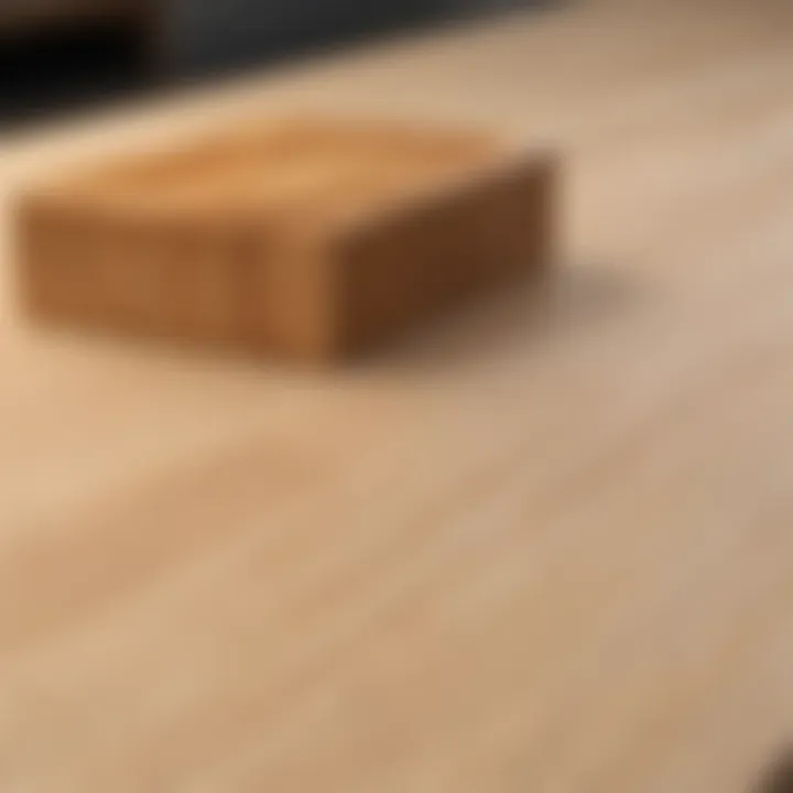 A close-up of a maple wood block top highlighting its smooth finish and rich color.