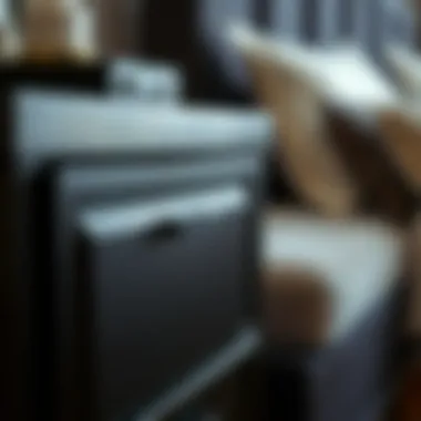 Close-up view of the three drawers in a black nightstand highlighting functionality.