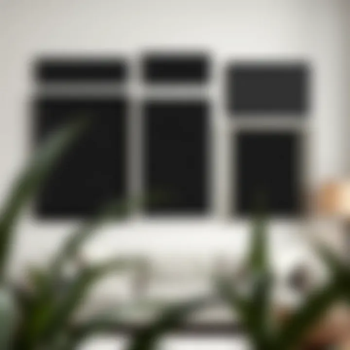 Tips for arranging oversized black picture frames on a wall