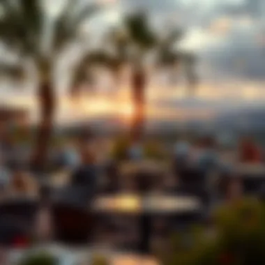 Group gathering around high top tables at sunset